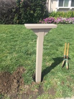 Post, with digging tool